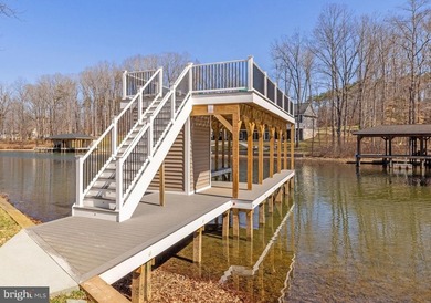Recently constructed in the highly-coveted lakeside Mill Run - photo 3