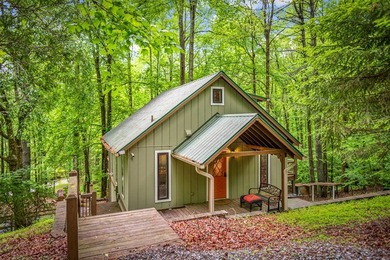 Tucked away on 3.3 acres of private, wooded serenity along 550 - photo 48