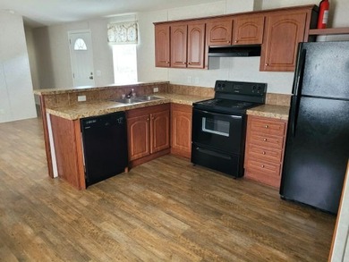 Find your place in the world at Meadowbrook, a well-maintained - photo 1