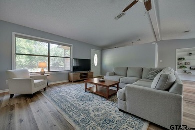 Nestled on a quiet street, this inviting residence blends - photo 4