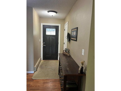 This spacious 5-bed, 3-bath walk-out home on Rainy River offers - photo 4