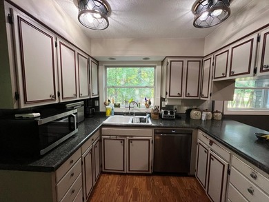 This spacious 5-bed, 3-bath walk-out home on Rainy River offers - photo 10
