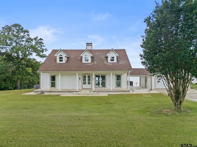 Discover the ultimate lakeside retreat at this stunning property - photo 2