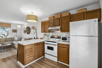 Experience breathtaking views from this second-story unit in - photo 9