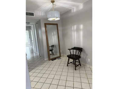 First (ground) floor unit with lake view from patio/Florida room - photo 1