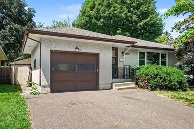 Welcome to this updated Rambler home located just minutes away - photo 1