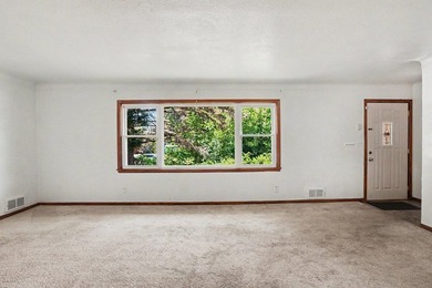 Welcome to this updated Rambler home located just minutes away - photo 2