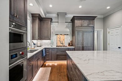 STUNNING LAKEFRONT HOME IN GATED HARBOR CLUB - REMODELED FROM - photo 22