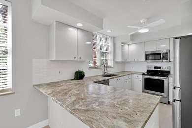 Stunning 3BR/2BA corner unit in Grand Harbor, ideally located on - photo 8