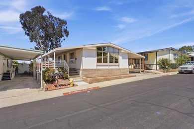 Deeply reduced and PRICED TO SELL! Welcome to easy, resort-style - photo 1