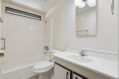 Deeply reduced and PRICED TO SELL! Welcome to easy, resort-style - photo 10
