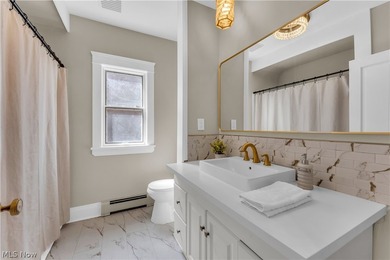 Welcome to this fully updated duplex in the heart of Euclid - photo 17