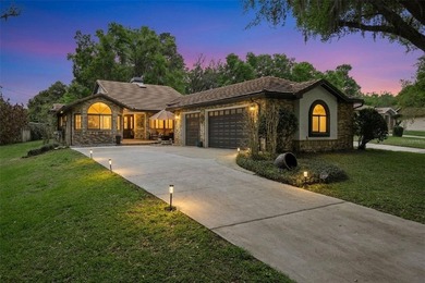 Welcome to elevated lake living, nestled within the sought-after - photo 1