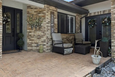 Welcome to elevated lake living, nestled within the sought-after - photo 2