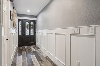 Welcome to elevated lake living, nestled within the sought-after - photo 3
