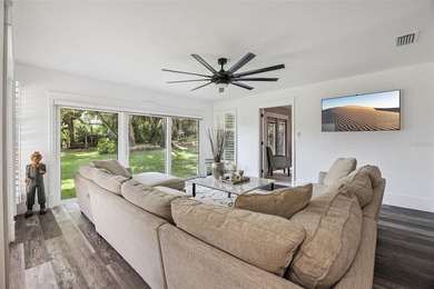 Welcome to elevated lake living, nestled within the sought-after - photo 8