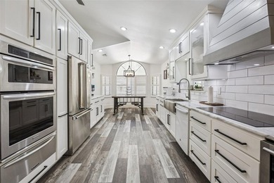 Welcome to elevated lake living, nestled within the sought-after - photo 9