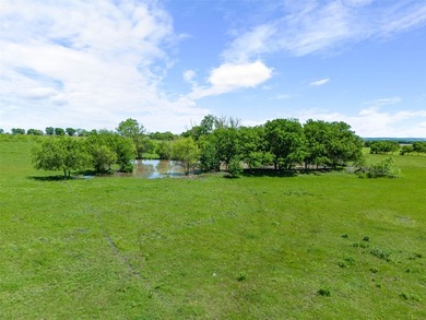 This 27.16-acre property, zoned for pre-development, offers a - photo 3