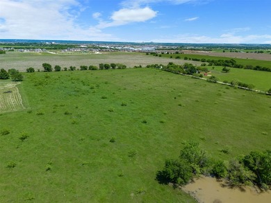 This 27.16-acre property, zoned for pre-development, offers a - photo 4