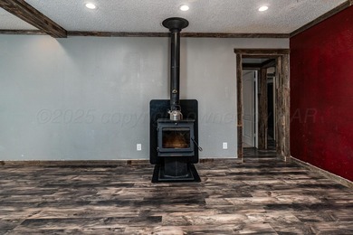 Versatile home in North Amarillo on a half-acre+ lot! Updated