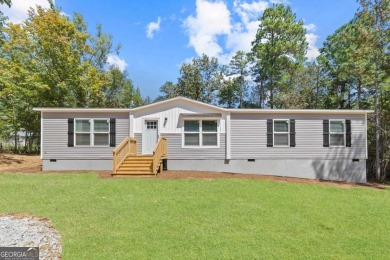 Lake Home For Sale in Eatonton, Georgia