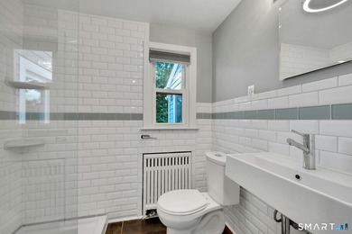 Beautifully updated and deceptively spacious, this move-in ready - photo 15
