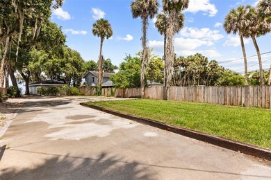 Nestled on a breathtaking .4-acre lot on beautiful Lake Harney - photo 4
