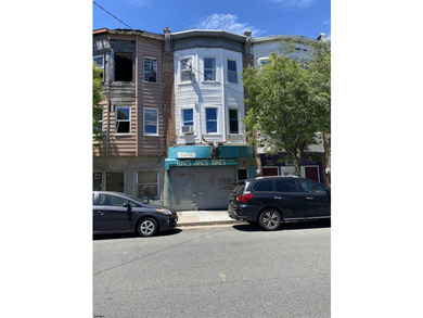 This mixed-use property presents a unique investment or - photo 1