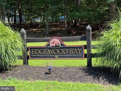 Beautiful lot in the desirable Edgewood Bay Subdivision. Recent - photo 2