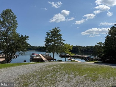 Beautiful lot in the desirable Edgewood Bay Subdivision. Recent - photo 3