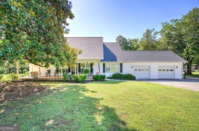 Nestled on 2.83 beautifully landscaped acres surrounded by - photo 1