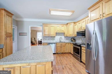 Nestled on 2.83 beautifully landscaped acres surrounded by - photo 10
