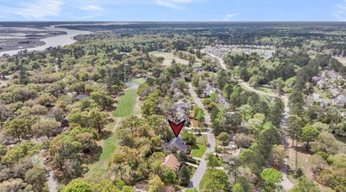 Situated on over a third of an acre on the 18th hole in the - photo 40