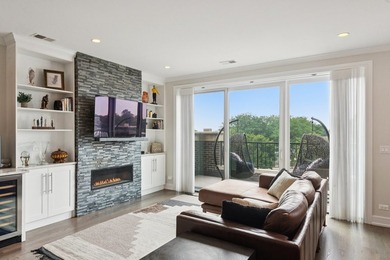 Sun-drenched penthouse offering 3 bedrooms, 2 baths, and an - photo 3