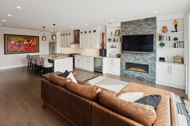 Sun-drenched penthouse offering 3 bedrooms, 2 baths, and an - photo 5