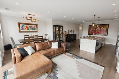 Sun-drenched penthouse offering 3 bedrooms, 2 baths, and an - photo 7