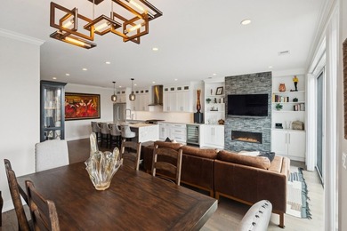 Sun-drenched penthouse offering 3 bedrooms, 2 baths, and an - photo 8