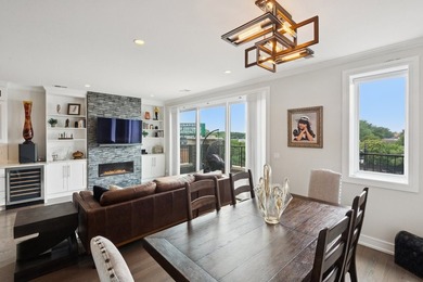 Sun-drenched penthouse offering 3 bedrooms, 2 baths, and an - photo 9