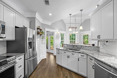 On a generous 0.63-acre corner lot in golf cart-friendly - photo 11
