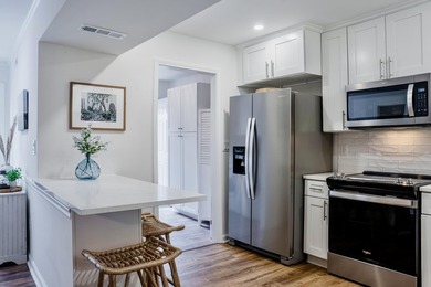 Welcome to your dream home nestled amidst breathtaking golf - photo 5