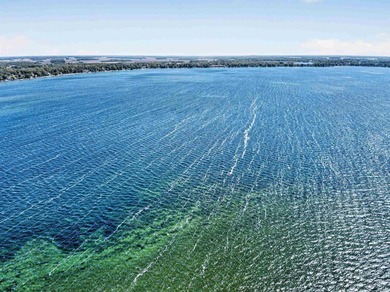 The value is in the setting-53 feet of Lake Wawasee frontage, a - photo 12