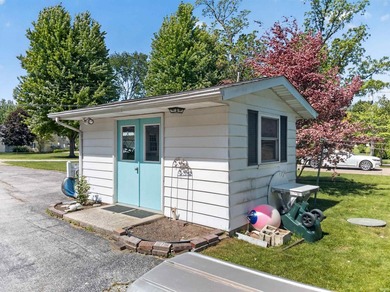 The value is in the setting-53 feet of Lake Wawasee frontage, a - photo 13