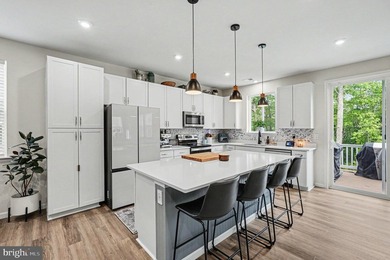 Welcome home to effortless living in this nearly new, 3-year-old - photo 2