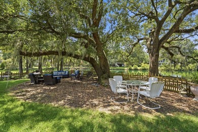Enjoy the peaceful setting under the beautiful oak trees with - photo 42