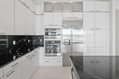 Better than new! 4 BR 4.5 BA with den, bonus room and 3 CG. This - photo 21
