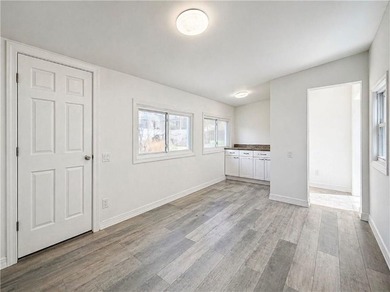Discover a rare opportunity to own a fully detached two-family - photo 29