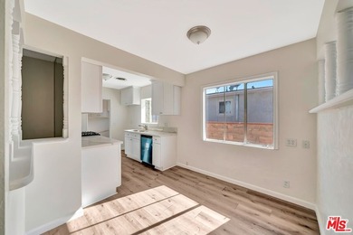 This charming single-story home blends mid-century character - photo 11