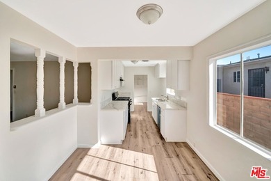 This charming single-story home blends mid-century character - photo 12