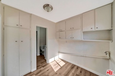 This charming single-story home blends mid-century character - photo 32