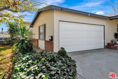 This charming single-story home blends mid-century character - photo 36